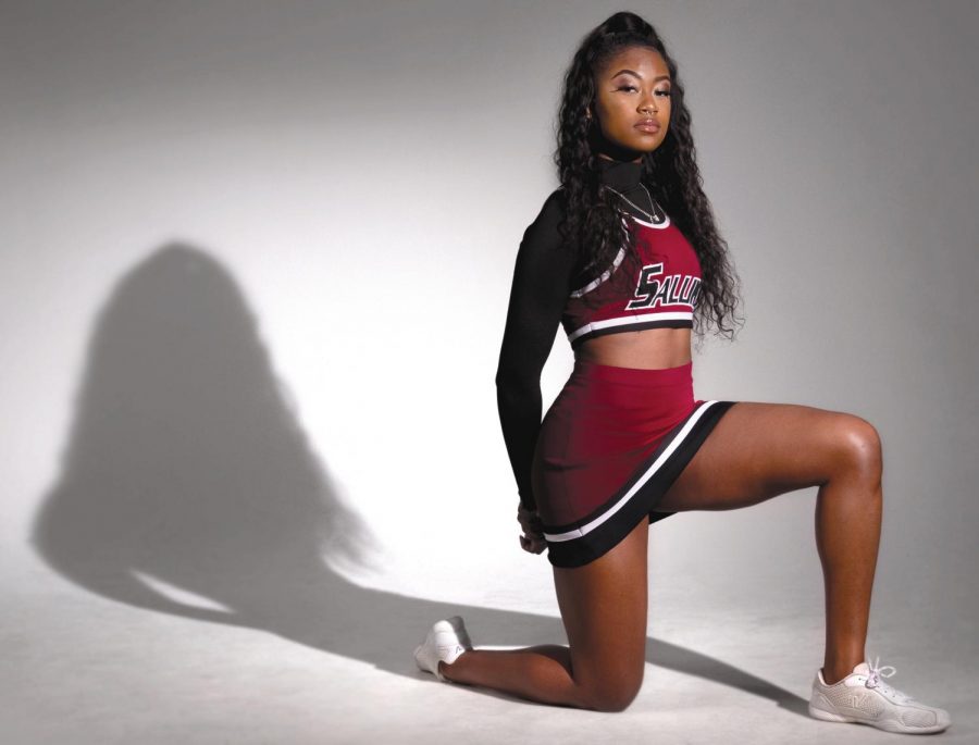 Alaysia Brandy, a junior studying biological sciences from Chicago, poses for a portrait on Feb. 27, 2019, in a studio at Southern Illinois University. Brandy was one of three cheerledaers who knelt during the national anthem during athletics events last year to protest police brutality. 