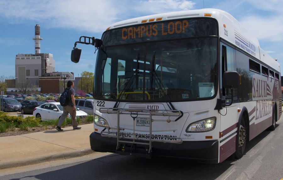 The Campus Loop bus departs from its bus stop on Wednesday, April, 2019, in front of SIU’s Student Center. 