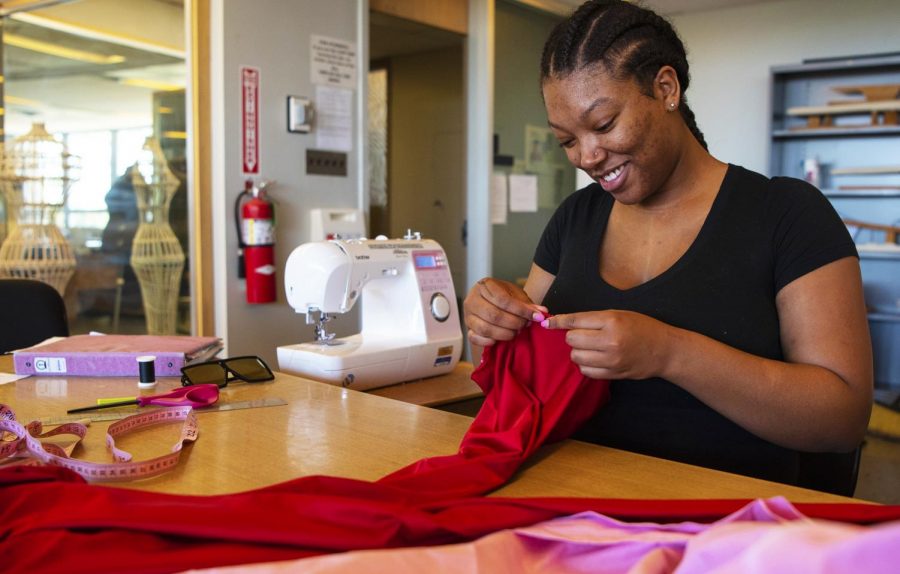 Terrian Brownlow, a senior majoring in Fashion Design, works on her fashion project on Tuesday, April 17, 2019, on the third floor of Quigley Hall. 