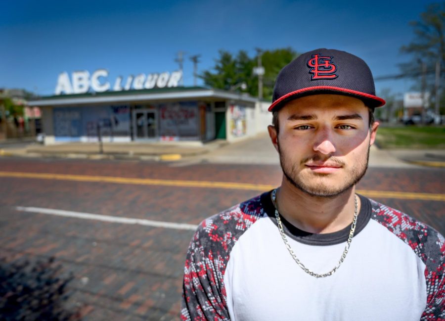 Skyler Cantrell, 21, of Altona, poses for a portrait on Tuesday, April 16, 2019, outside of ABC Liquor Mart in Carbondale. Cantrell, an Altona volunteer firefighter, was on the scene of a four person shooting late Friday night in Carbondale.