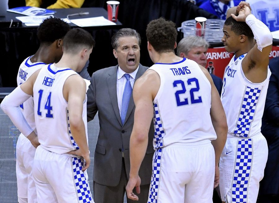Kentucky coach John Calipari talks to his players during the second half of the NCAA Midwest Regional Final on Sunday, March 31, 2019 at the Sprint Center in Kansas City, Mo.
