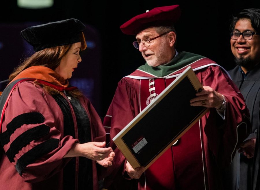 Academy Award nominee, Emmy Award-winning actress Melissa McCarthy receives an honorary doctorate of performing arts degree from Interim Chancellor John Dunn on Saturday, May 11, 2019 during the 2019 commencement inside the SIU Arena. 