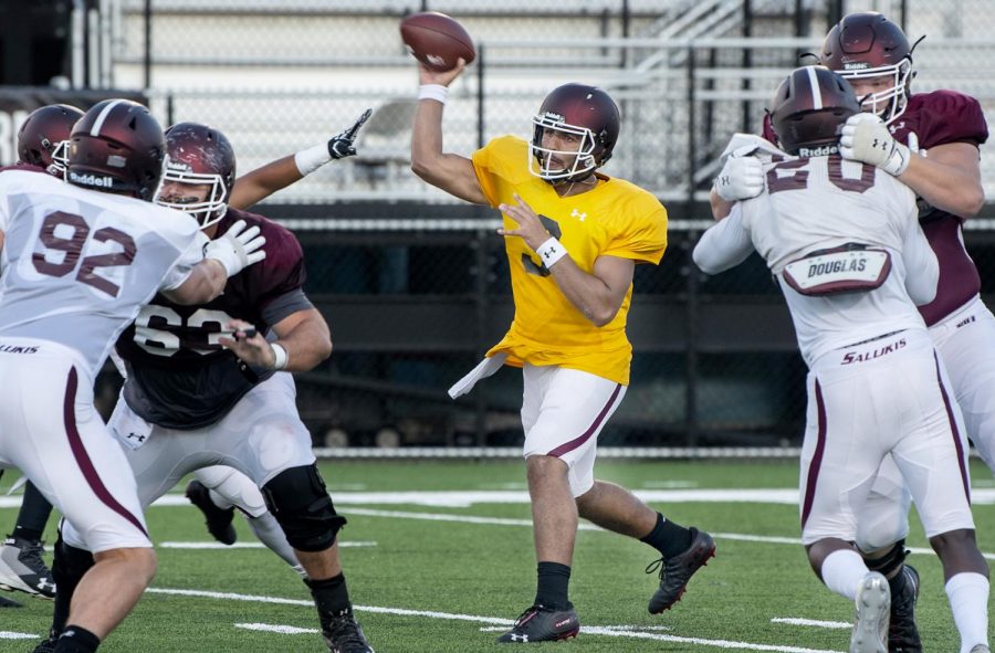 Kare Lyles, of Madison, Wis., attempts to throw a pass on on Thursday, August 15, 2019, at the SIU Football Scrimmage at Saluki Stadium. (Carson VanBuskirk | @carsonvanbDE)
