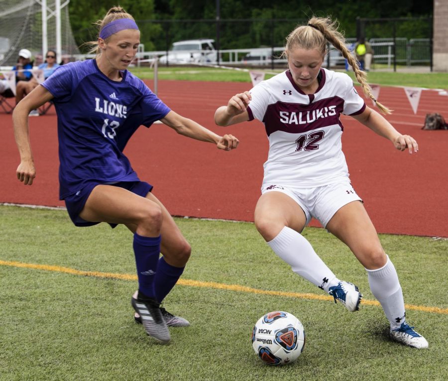 Madison Meiring, of Martinsville, Ind., protects the ball from a defender on Sunday, Aug. 25, 2019, at the SIU vs. North Alabama soccer game in Carbondale. 