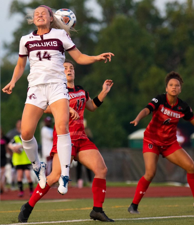 Saluki freshman Kaitlin DuCharme hits the ball on Saturday, Aug. 17, 2019 during the Salukis' 1-2 loss against the Southeast Missouri State University Redhawks at the Lew Hartzog Track & Field Complex.