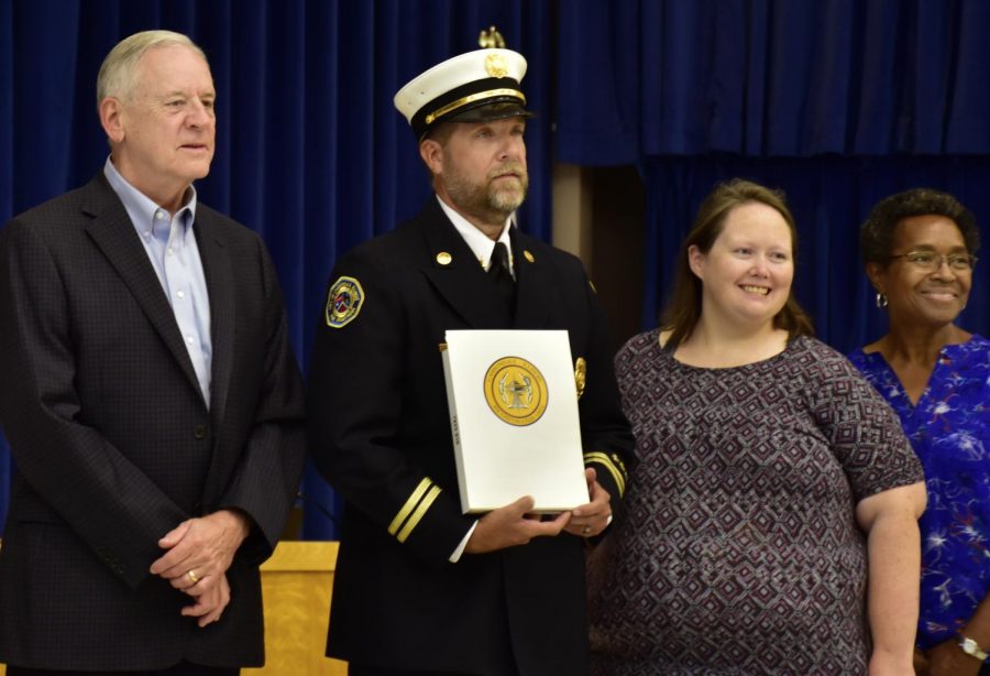 Former Fire Department Chief, Carl Sisk, has his retirement recognized by Carbondale City Council members Jeff Doherty, Jessica Bradshaw, Carolin Harvey, along with Carbondale Mayor Mike Henry on Tuesday, Aug. 27, 2019. 