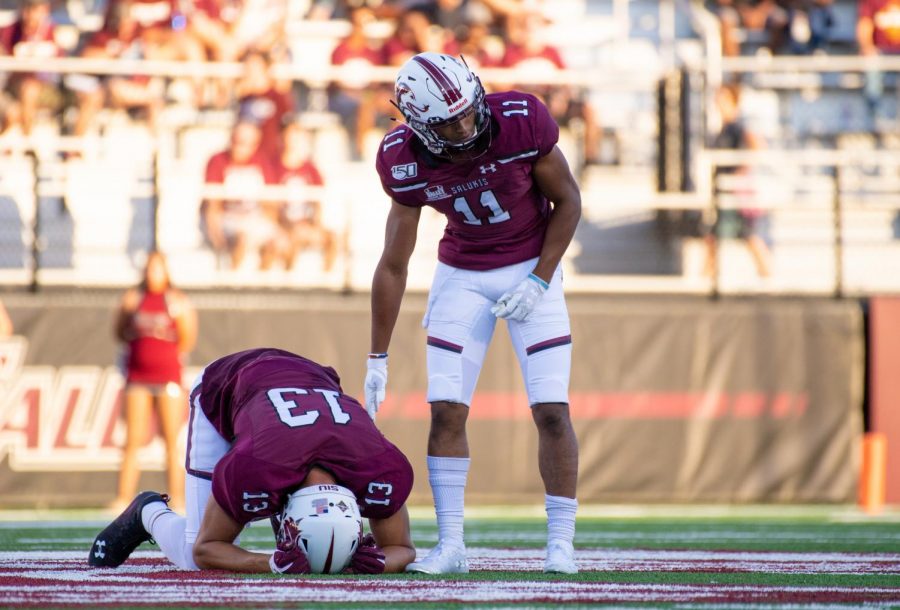 Saluki senior Nigel Kilby suffers an injury after a play on Saturday, Sept. 14, 2019 at SIU Arena during the Salukis 28-14 win against the Tennessee-Martin Skyhawks. 