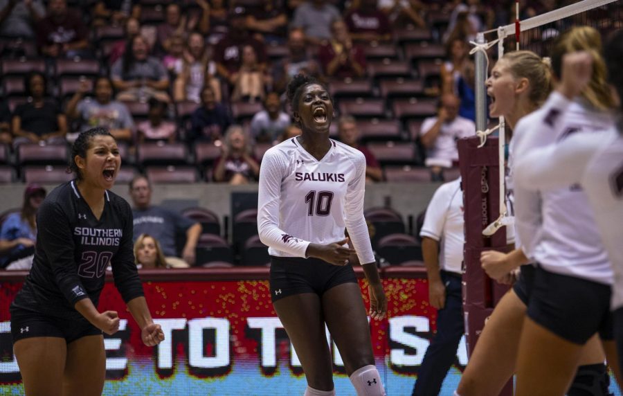 Laura Rojas, of Orlando, Fla., and Savannah Sheridan, of Chicago, celebrate after a scored point  on Saturday, Sept. 14, 2019, during SIU's 3-2 win against Alabama State. 