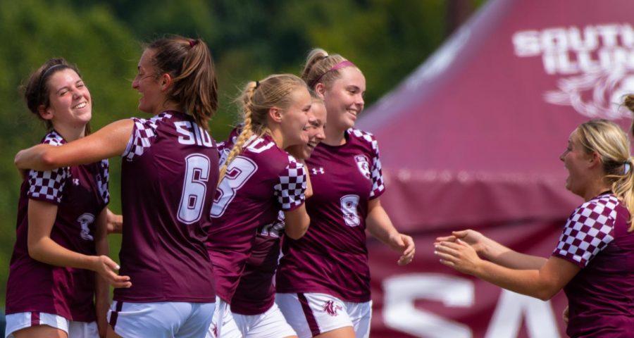 The Salukis celebrate after a goal by Madison Meiring on Sunday, Sept. 15, 2019 during the Salukis 2-1 win in overtime against the Morehead State Eagles at the Lew Hartzog Track & Field Complex.