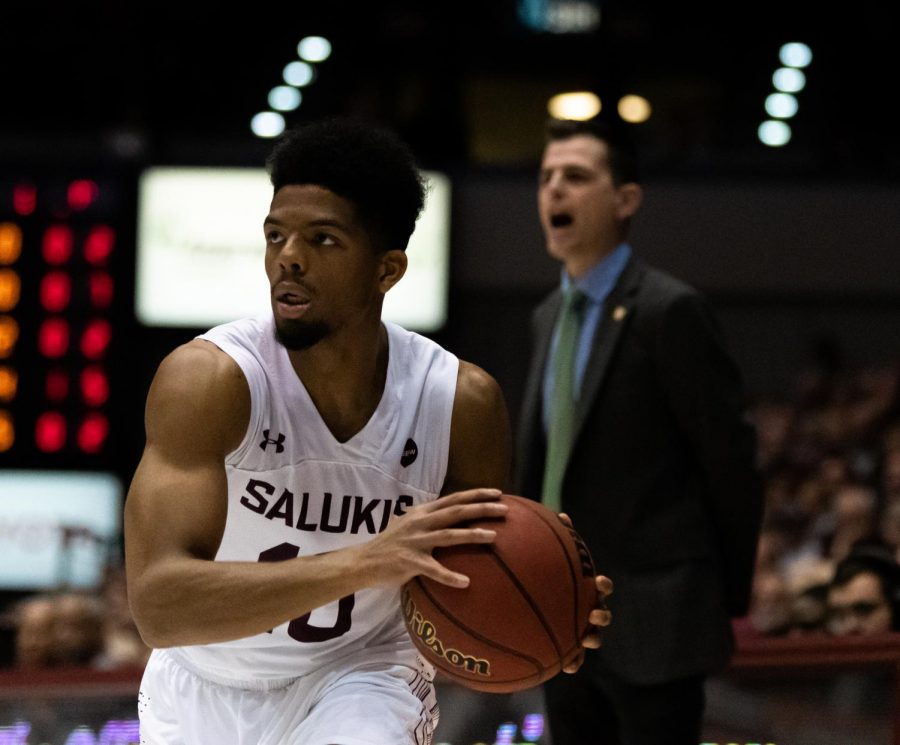 Senior, Guard, Aaron Cook Jr. moves the ball down the court to his teammates on Saturday, Nov. 16, 2019 during the Salukis 60-76 loss to the San Francisco Dons inside the Banterra Center.