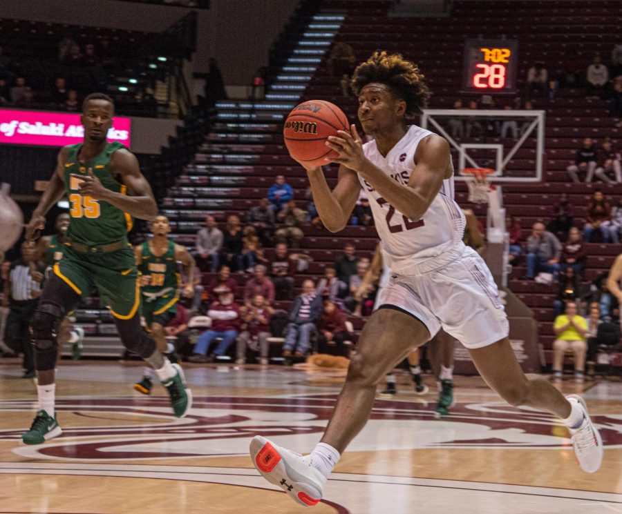 Harwin Francois breaks away for the basket during SIU’s 76 - 59 win over Norfolk State on Wednesday, Dec. 4, 2019 at Banterra Center.