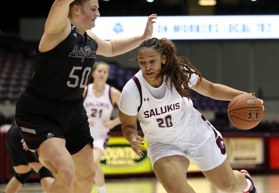 Saluki forward Gabby Walker makes her move to get past Lady Bears center Emily Gartner on Friday, January 17, 2020, during the Salukis dramatic 70-68 victory over the Missouri State Lady Bears at the Banterra Center. (Angel Chevrestt)