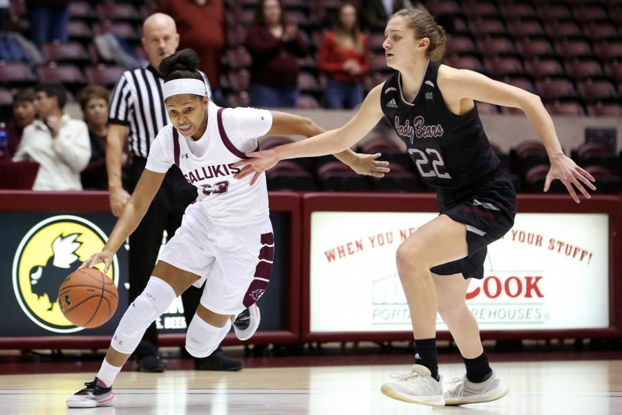 Saluki guard Kristen Nelson moves the ball past the defending Lady Bears guard Alexa Willard on Friday, January 17, 2020, during the Salukis dramatic 70-68 victory over the Missouri State Lady Bears at the Banterra Center.