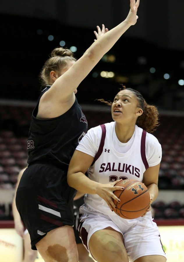 Saluki forward Gabby Walker is checked by Lady Bears center Emily Gartner on Friday, January 17, 2020, during the Salukis dramatic 70-68 victory over the Missouri State Lady Bears inside the Banterra Center.
(Angel Chevrestt)