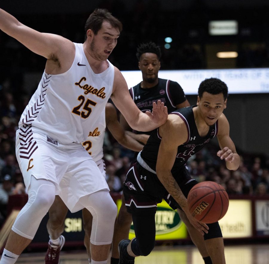 Southern Illinois Salukis  Senior Guard Eric McGill defends the ball in the game against Lyola Ramblers 68 to 63 in the Wednesday January 29, 2020 game at the SIU Bantera Arena.