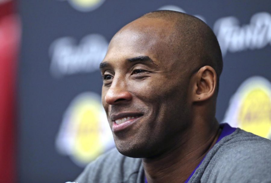 Los Angeles Lakers forward Kobe Bryant, speaks with members of the media, before his teams game against the Chicago Bulls, at the United Center, in Chicago, on Feb. 21, 2016.