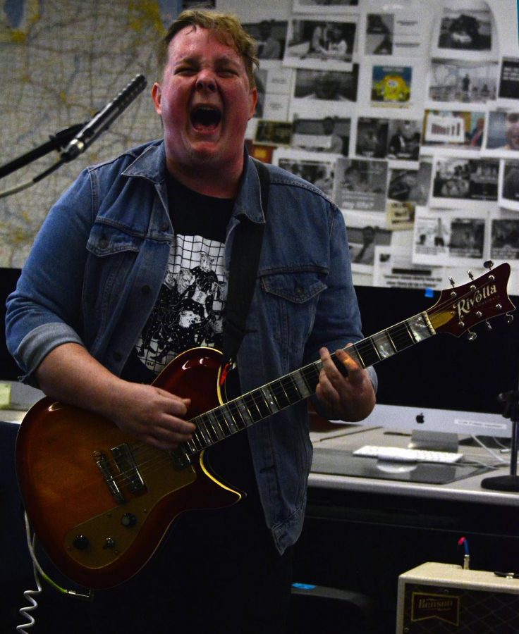 Nate Girard from the band North by North, play in the Daily Egyptian’s newsroom, at SIU, on February 28, 2020. 