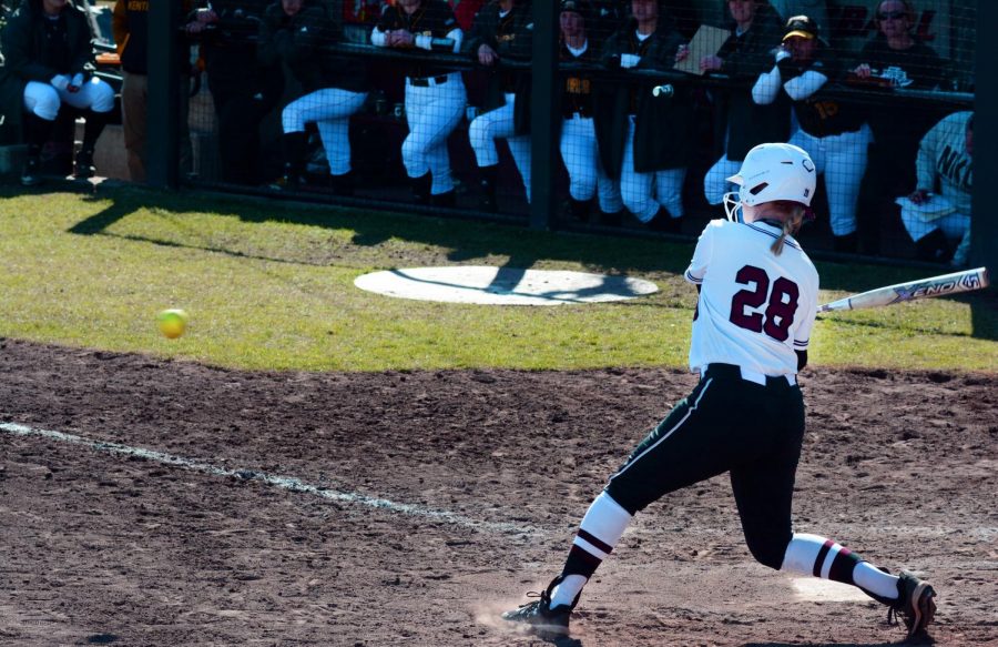 Saluki junior infielder/outfielder Jenny Jansen hits the ball, Saturday, February 29, 2020, during the Salukis 5-0 win against Northern Kentucky University at Charlotte West Stadium.