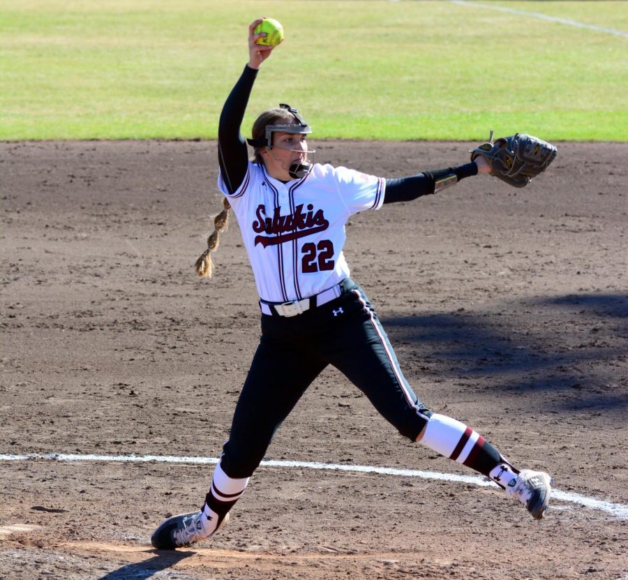 Saluki pitcher Sarah Harness pitches the ball, Saturday, February 29, 2020, during the Salukis 5-0 win against Northern Kentucky University at Charlotte West Stadium.