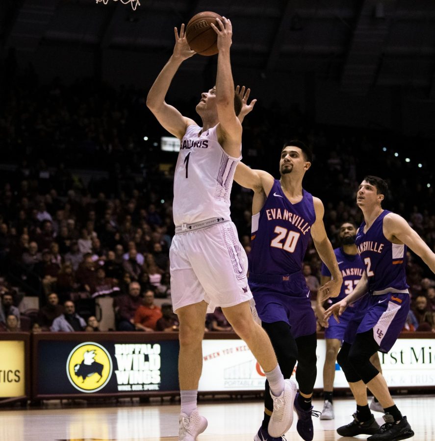 Southern Illinois University Saluki number one forward, Marcus Domask, jumps for a basket basket during the basketball game against the Evansville Purple Aces in the SIU Banterra Center. The game ended 53 to 70 with SIU taking the win on Thursday night, February 20, 2020.