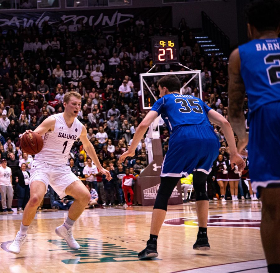 Salukis+freshman+forward+Marcus+Domask+begins+to+put+the+moves+around+a+Sycamore+defended+during+SIU%E2%80%99s+Senior+Night.+SIU+would+go+on+to+loss+to+Indiana+State+77-68+on+Wednesday%2C+Feb.+26%2C+2020+at+the+Banterra+Center.+Jared+Treece+%40bisalo+