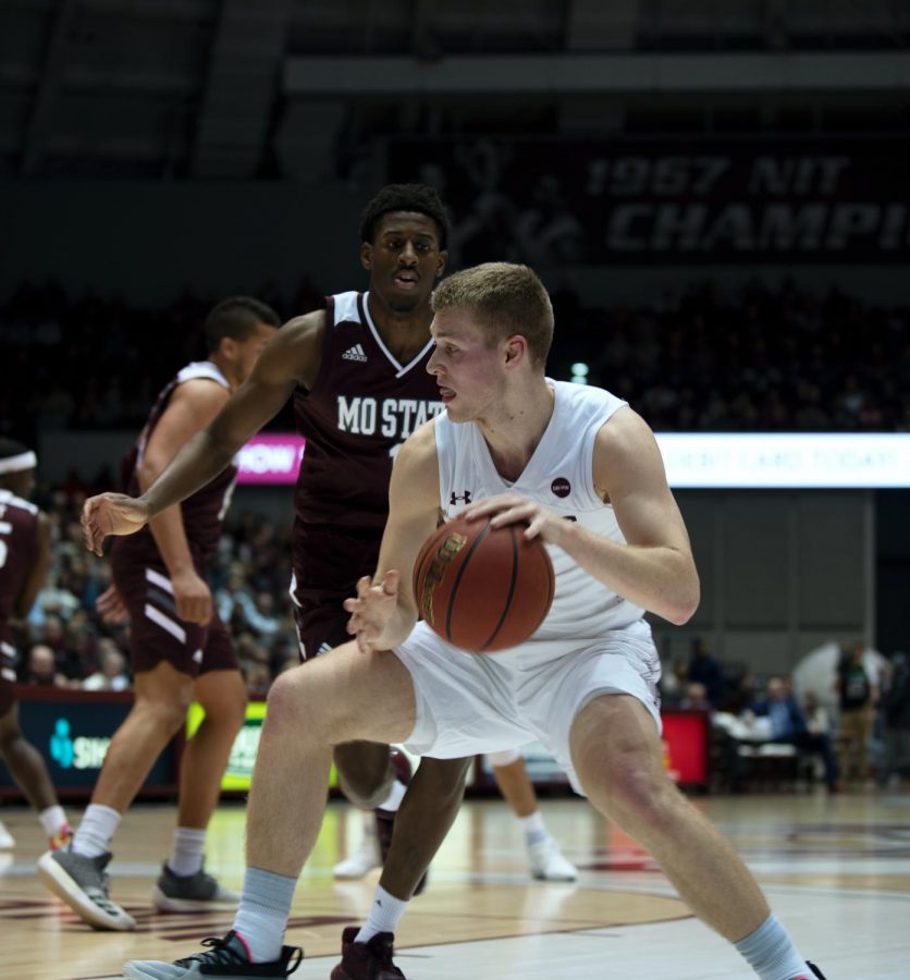 Southern Illinois University Saluki number one, Marcus Domask, Forward, defends the ball from the Missouri State Bears during the Saturday night game at the SIU Banterra Center ending the game 66 to 68 with Salukis taking the win on February 8, 2020.