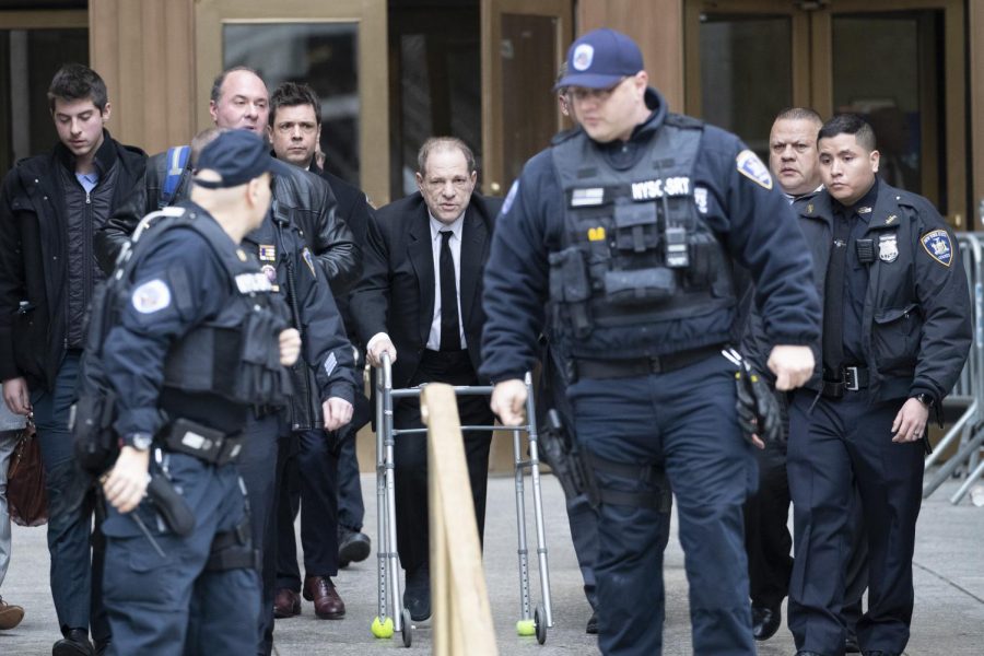 Harvey Weinstein, center, is surrounded by court officers as he leaves court following a pre-trial hearing on Monday, Jan. 6, 2020, in New York. The disgraced movie mogul faces allegations of rape and sexual assault.