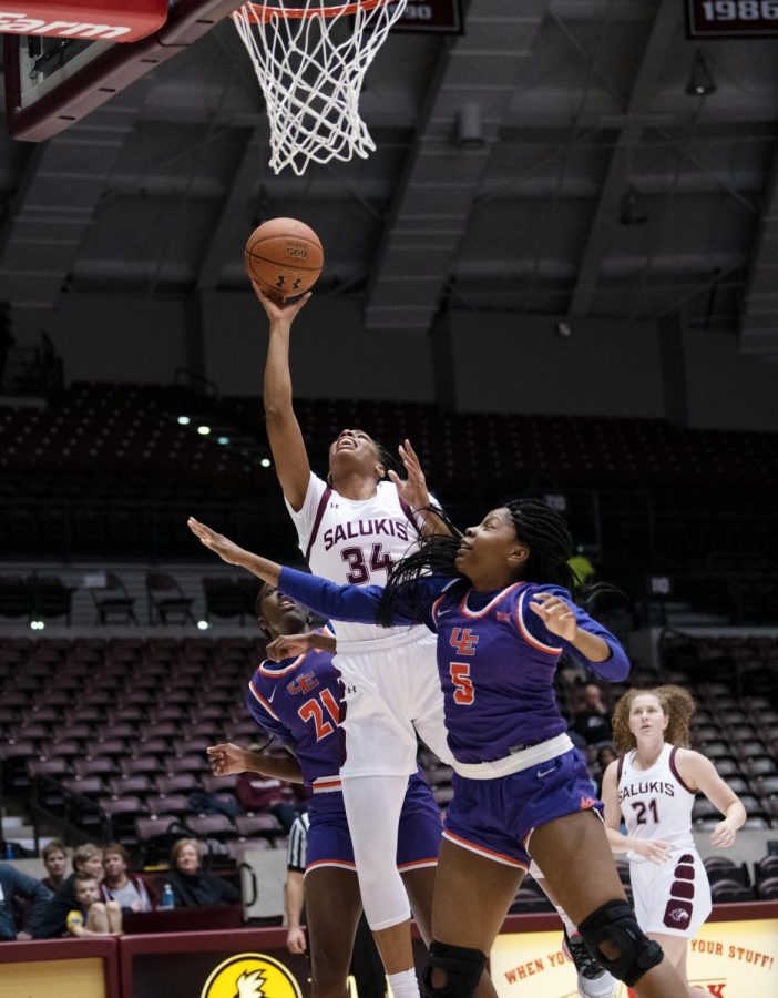 Southern Illinois Saluki number 34 forward, Nicole Martin, defends the ball during the Sunday afternoon game against the Evansville Purple Aces. The game ended 99 to 60 with SIU taking the win on February 23, 2020 at the SIU Banterra Center.
