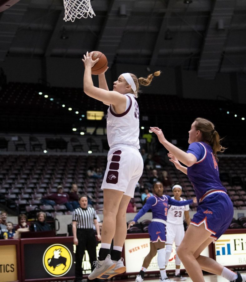 Southern Illinois Saluki number 31 center, Lauren Hartman, goes for a basket during the Sunday afternoon game against the Evansville Purple Aces. The game ended 99 to 60 with SIU taking the win on February 23, 2020 at the SIU Banterra Center.