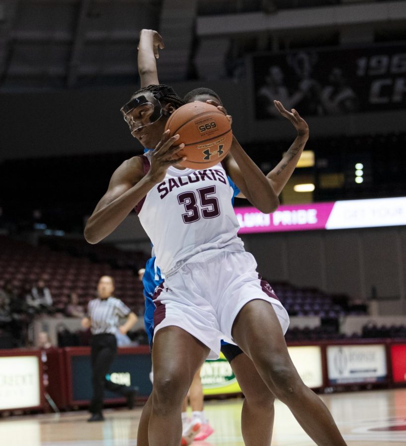 Southern Illinois Saluki number 35 forward, Awa Keita, defends the ball from Indiana State Sycamores during the Friday night woman’s basketball game at the SIU Banterra Center. The game ended with SIU at 60 and ISU at 42 on February 21, 2020.
