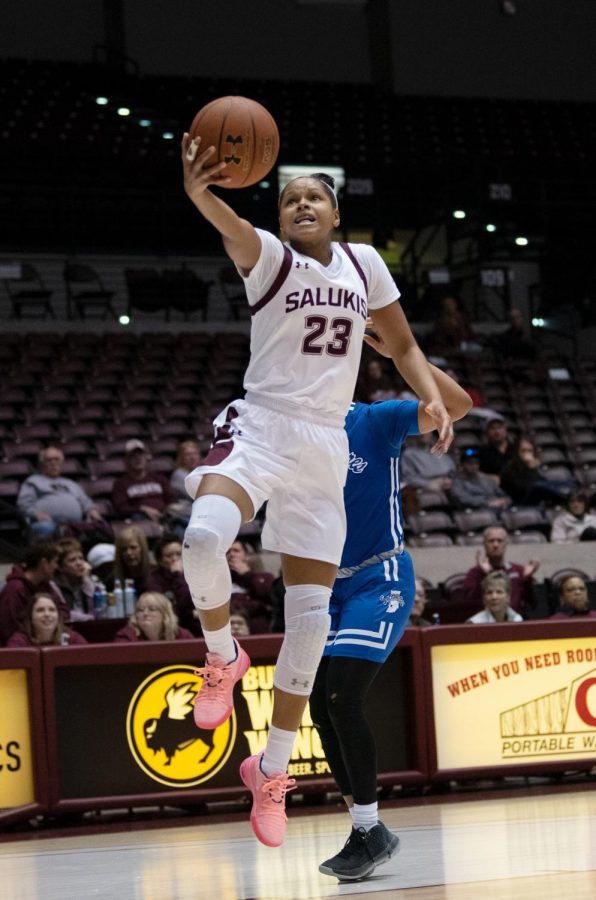 Southern Illinois Saluki number 23 guard, Kristen Nelson, jumps to grab the ball from Indiana State Sycamores during the Friday night woman’s basketball game at the SIU Banterra Center. The game ended with SIU at 60 and ISU at 42 on February 21, 2020.