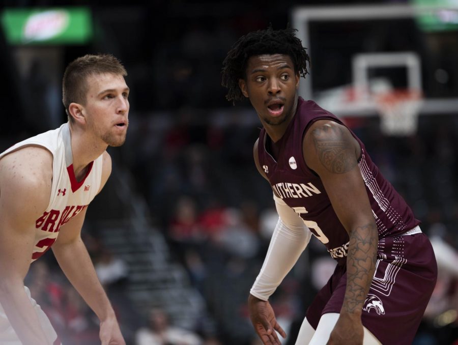 Southern Illinois Saluki Guard, Lance Jones, defends his team againt the Bradley Braves during the Missouri Valley Comfrence at the St. Louis Enterprice Center. The game ended with Bradley beating Southern 64 to 59 on Friday, March 6, 2020.