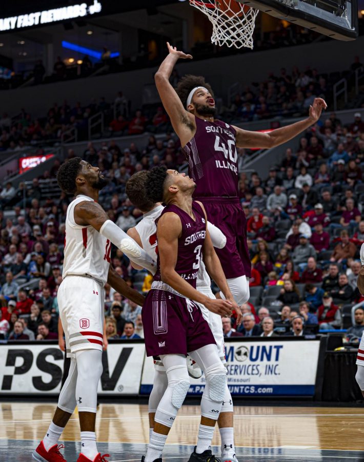 Southern Illinois Saluki Center, Barret Benson, dunks the ball and scores against the Bradley Braves during the Missouri Valley Comfrence at the St. Louis Enterprise Center. The game ended with Bradley beating Southern 64 to 59 on Friday, March 6, 2020.