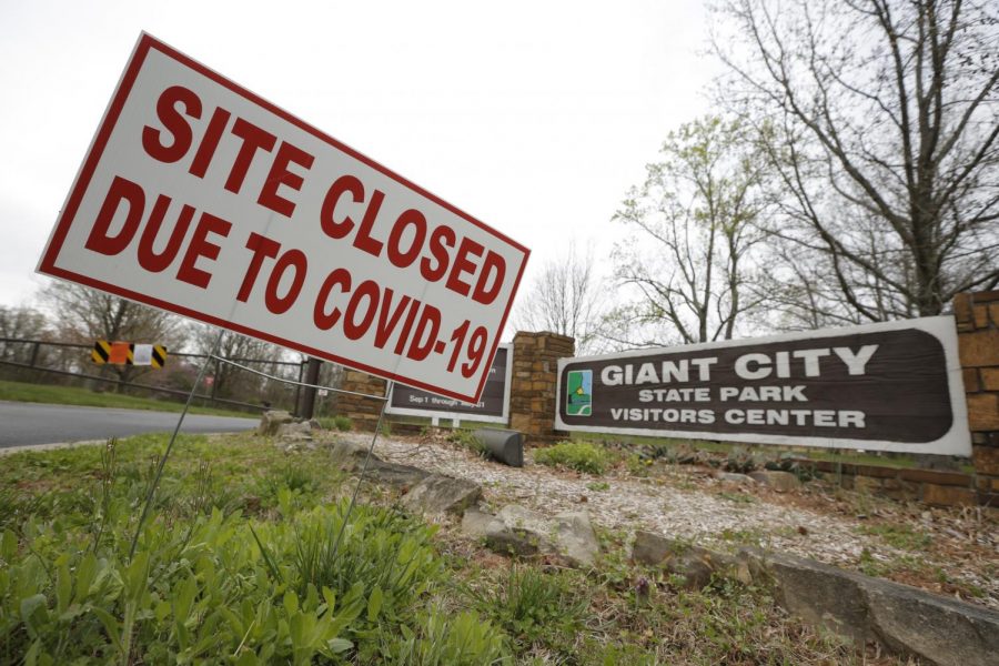 Signs indicating the closure of Giant City State Park due to the Coronavirus Disease 2019 pandemic, Makanda, Illinois, Saturday, April 4, 2020.  Illinois Governor J.B. Pritzker, issued a statewide shelter-in-place order, effective March 21, 2020, closing all nonessential businesses, and barring all activities at state parks, fish and wildlife areas, recreational areas and historic sites.
