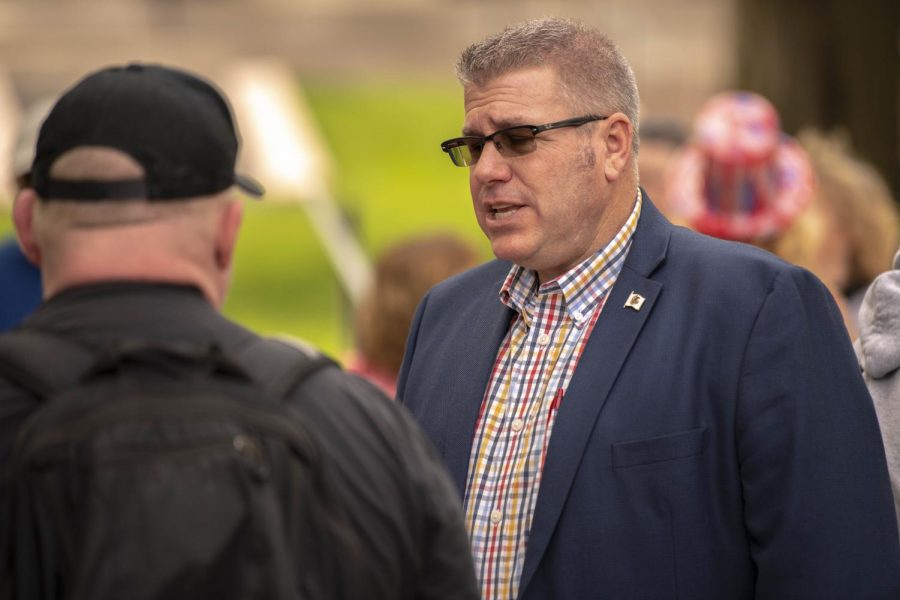 Guest speaker Rep. Darren Bailey, who in currently suing Gov. J.B. Pritzker over the Shelter-in-Place order, talks to protestors who came out to the Reopen Illinois protest at Friday, May 1, 2020 in  Springfield, IL.