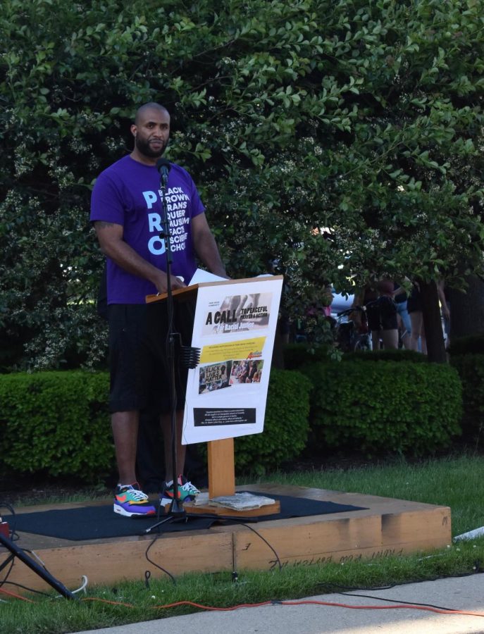 Adrian Hill addresses attendees at the vigil Tuesday June 2. 2020 in Park Ridge Ill. 
