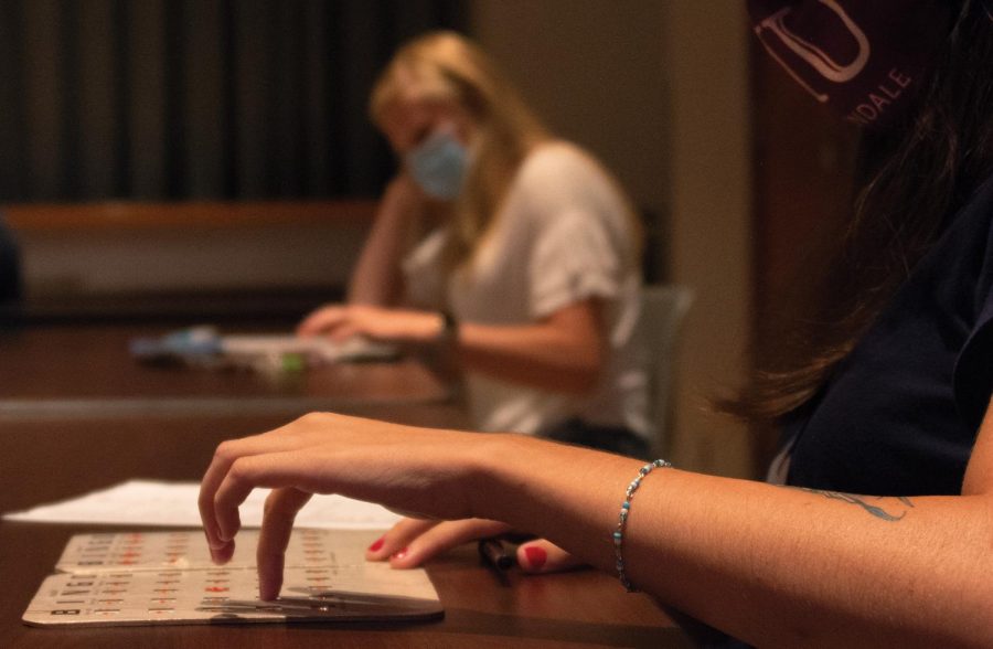 Trinity Kirby, a freshman at SIU studying zoology, says, “Bingo really fun. I haven’t won anything, but it’s fun” during Bingo at SIU, August 22, 2020, in Carbondale, ILL. 