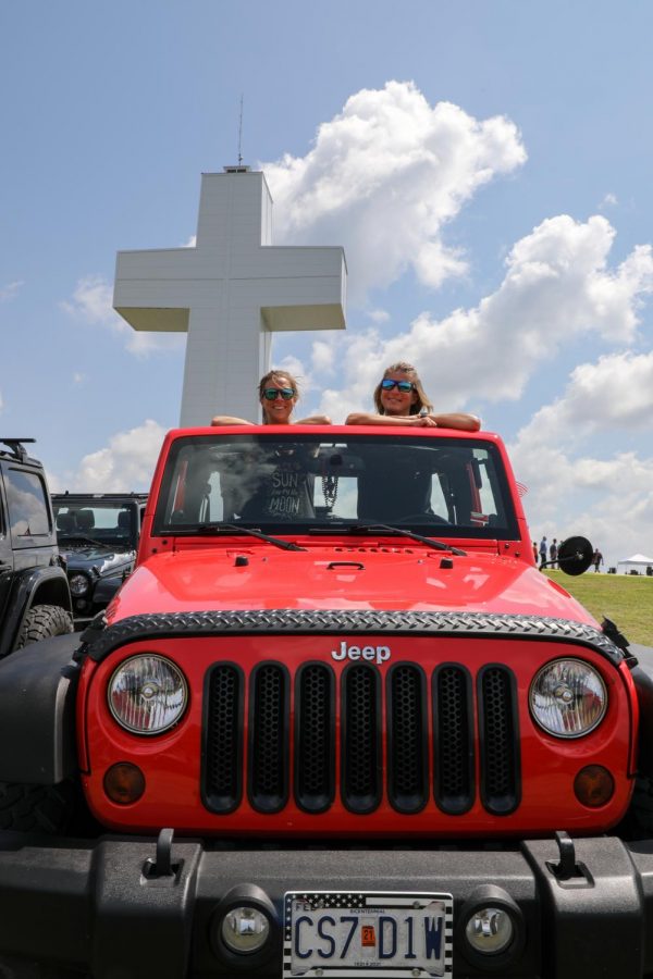 Amanda Schneid and Chaz Stortz of Burfordville, Mo. pose after traveling about an hour and a half to the Blessing of the Jeeps event in Alto Pass, Ill. “I think everyone needs blessed” Stortz said on Aug. 15, 2020