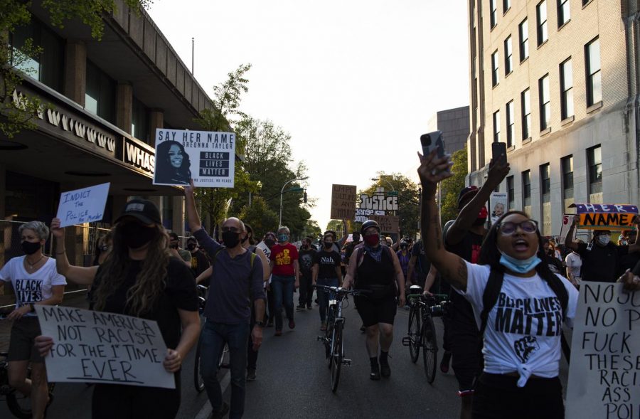 Black Lives Matter protesters march down West Chestnut St. in downtown Louisville, Ky. on Sept 26 in protest of the grand jury decision in the Breonna Taylor case. 