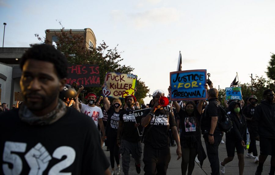 Black Lives Matter protesters march down South 2nd St. in downtown Louisville, Ky. on Sept 26 in protest of the grand jury decision in the Breonna Taylor case. 