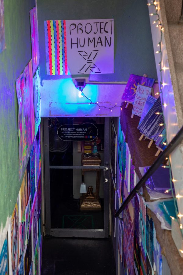 Project Human X features a glow in the dark art wall on Sept. 22, 2020. “COVID-19 has forced us to become more creative,” Marquez Scoggin said about his and Cree Sahidah Glanz’s business.