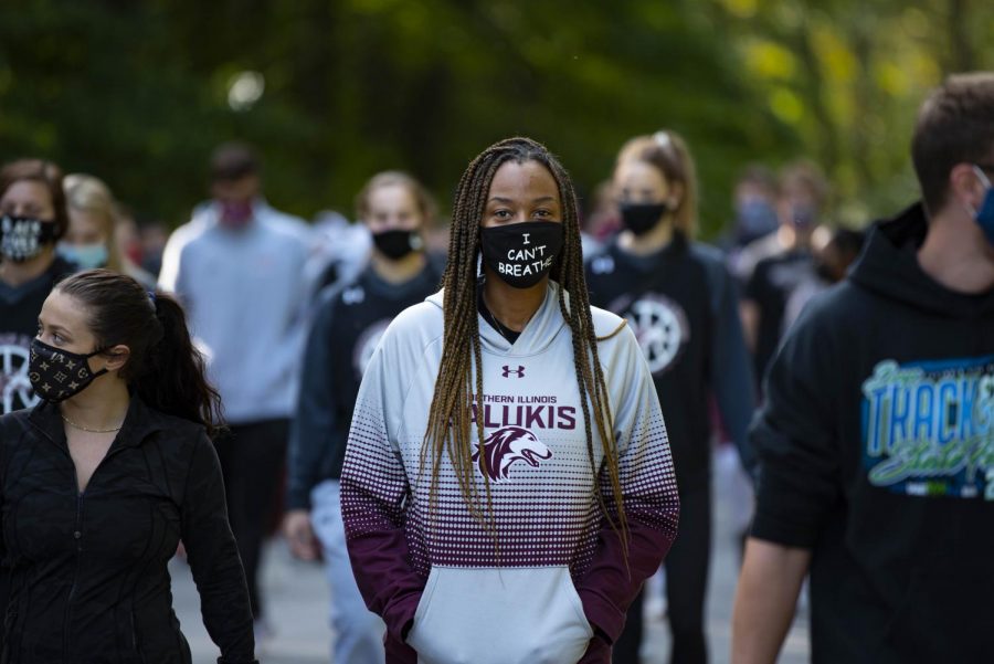 Kyra Hunter, SIU volleyball player, walks among other student-athletes at SIU during the Run/Walk event put on by the Saluki Unity Saturday, Sept. 19, 2020 at SIU. Hunter wears a face mask with I cant breathe, a phrase that is associated with the Black Lives Matter movement as it has been a phrase used by victims of police brutality. Hunt said, Im here to support the social injustices and everything is happening in this country. Im here to show my support and be a voice for the community who dont have a voice. The Walk/Run event raised money for the Boys and Girls Club of Southern Illinois.