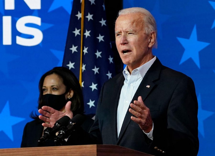 Democratic presidential nominee Joe Biden speaks while flanked by vice presidential nominee, Sen. Kamala Harris (D- California), at The Queen theater on Thursday, Nov. 5, 2020 in Wilmington, Delaware. Biden attended internal meetings with staff as votes are still being counted in his tight race against incumbent U.S. President Donald Trump, which remains too close to call. 
