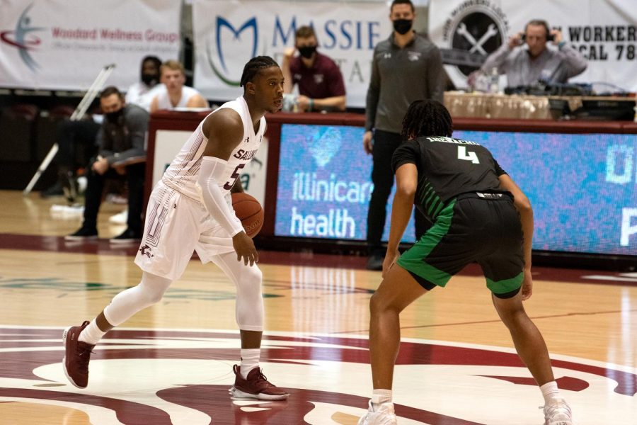 Lance Jones dribbles the ball during the SIU vs. North Dakota game Friday, Dec. 18, 2020, at the SIU Bantera Center in Carbondale Ill. SIU won with a final score of 62 to 50.