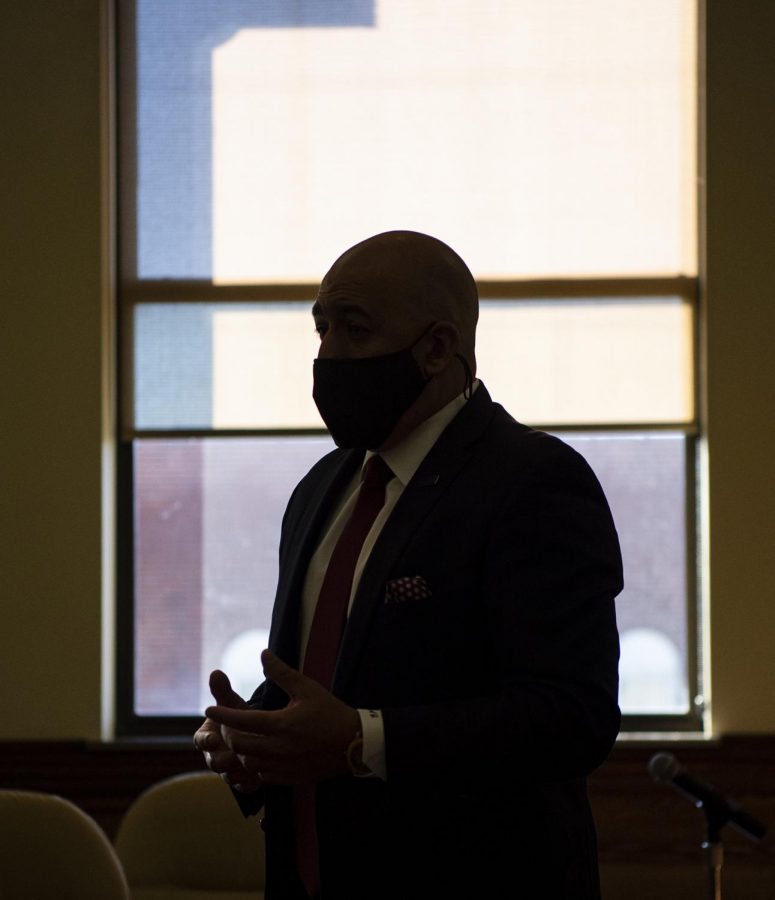 Newly sworn in States Attorney Joe Cervantez is silhouetted as he gives a brief speech after the ceremony at the Jackson County Courthouse in Murphysboro, Ill. Dec. 1, 2020.