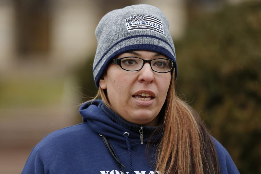 Ashley Ramos, a member of the nonprofit organization Back the Blue, which supports members of law enforcement and first responders, stands outside of the Illinois State Capitol building, protesting the recently signed police reform bill, Springfield, IL, Saturday, January 16, 2021.