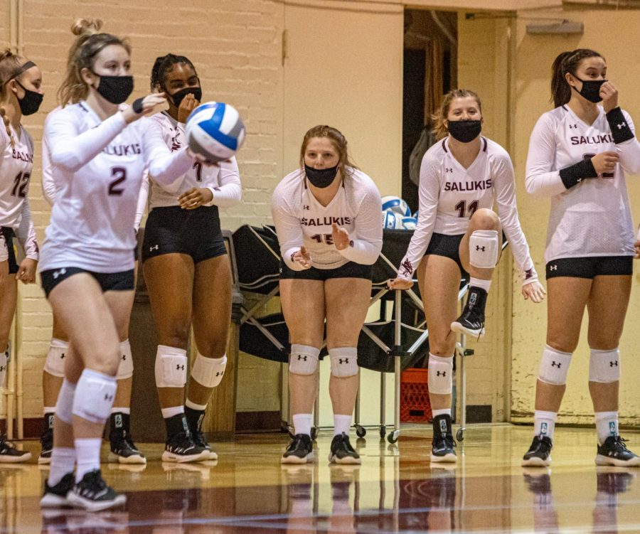 The+SIU+volleyball+bench+gets+hyped+as+freshman+MacKenzie+Houser+prepares+to+serve+against+Missouri+State+on+Saturday%2C+Jan.+30%2C+2021+in++Davies+Gym+at+SIU.+The+Salukis+would+go+onto+to+fall+to+the+Bears+3-2+in+the+Salukis+first+home+game+of+the+season.+