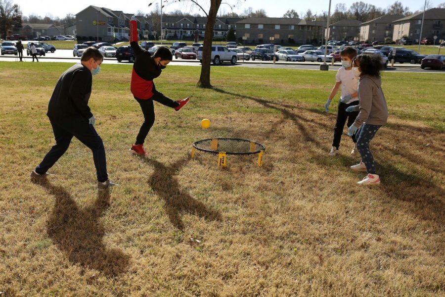 Students at Carbondale Middle School, from left: Hayden M.; Nath W.; Alexi K.; and, Marley S. participate in games during their physical education class on the last day of in-person learning, Friday, November 13, 2020.
