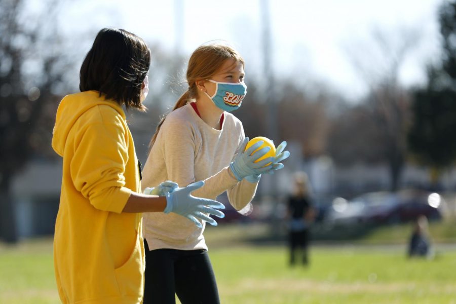 Carbondale Middle School students, Elise N., left, and Alice S., play a game during a Physical Education class on the last day of in-person learning, Friday, November 13, 2020.
