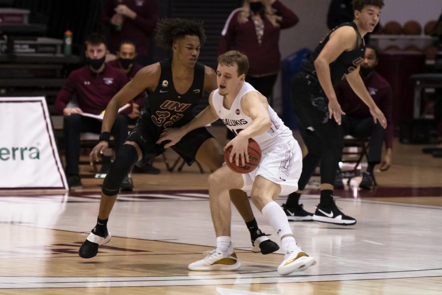 Southern Illinois Ben Harvey (10) attempts to drive a lane against Northern Iowa’s Tytan Anderson (32) during the game Saturday, Jan. 30, 2021 at the SIU Bantera Center in Carbondale, Ill Northern Iowa won with a  final score of 74 - 62.